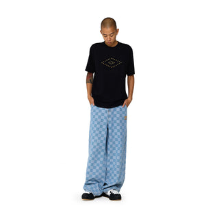 Light blue check denim pants on model with relaxed straight fit