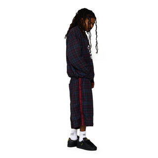 Plaid windbreaker shorts for men, side profile with Umbro logo detail