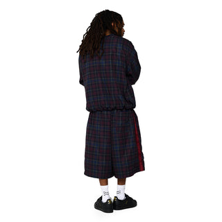 Plaid windbreaker shorts for men, rear view with Umbro logo on leg hem