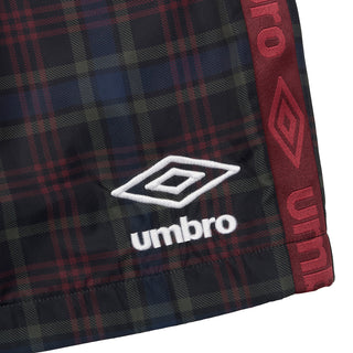 Umbro plaid windbreaker shorts side panel, red trim and Umbro logo