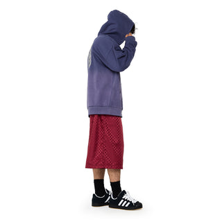 Cordovan checkered nylon shorts with Umbro logo, profile view