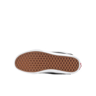 Youth sneaker outsole with brown textured tread and white rubber edge