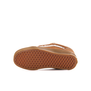Knu Skool youth sneakers with tan/brown outsole and white sherpa trim, side view