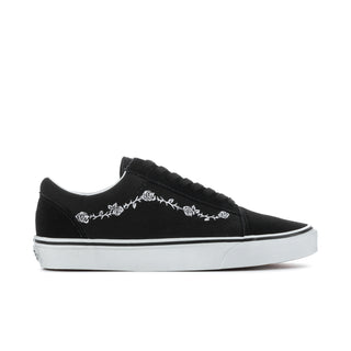Men's black low-top sneakers with white floral side embroidery and white rubber sole