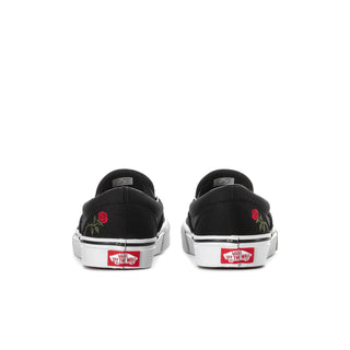 Black VANS slip-on sneakers, heel view, with red rose embroidery and label patch