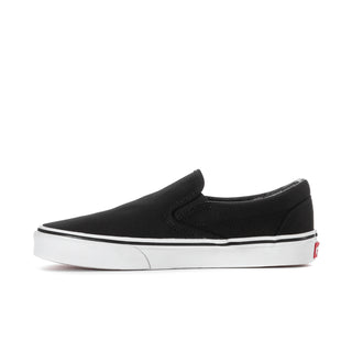 Black VANS slip-on sneakers, angled side view, smooth upper with white sole
