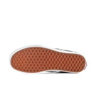 Black slip-on sneaker outsole with textured rubber tread