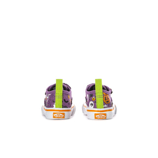 Purple toddler sneakers with orange heel tag and Halloween print, neon green accents