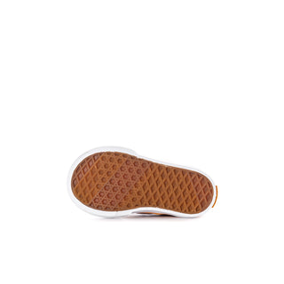 Toddler sneaker outsole with textured brown tread and white rubber edge