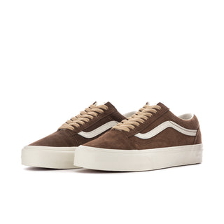 Women's brown lace-up low-top sneakers with white side stripes and white rubber sole.