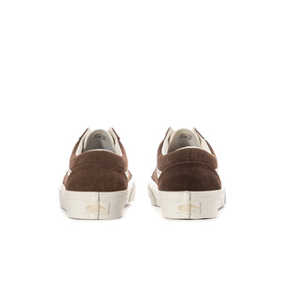 Women's brown sneakers back view with white heel patch and padded collar.