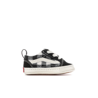 Infant slip-on crib shoes in black and white buffalo plaid with lace-up detail