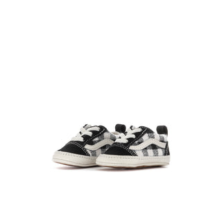 Infant black-and-white buffalo plaid slip-on crib shoes with white rubber sole