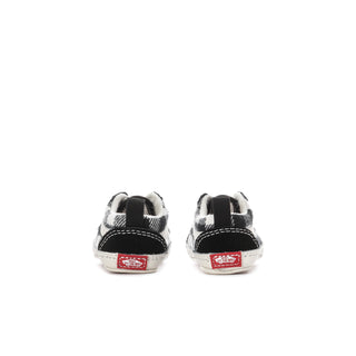 Infant black-and-white buffalo plaid crib shoes with heel loop and red label patch
