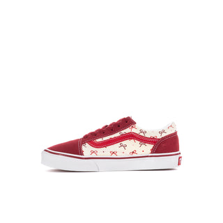 Side view of a burgundy and white kids' Old Skool V sneaker with bow print panels