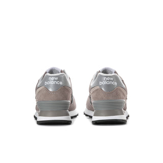 Women’s New Balance 574 sneakers in grey with white sole and heel tab detail