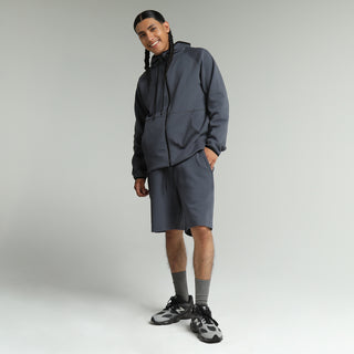 Men's dark blue knit shorts with drawstring waistband and relaxed fit
