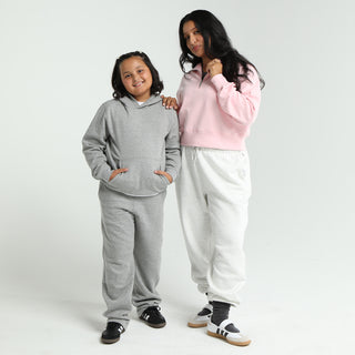 Youth heather grey fleece wide-leg pants with elastic waistband, side view