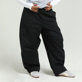 Women's black barrel pants with slouchy wide legs and elastic waist detail