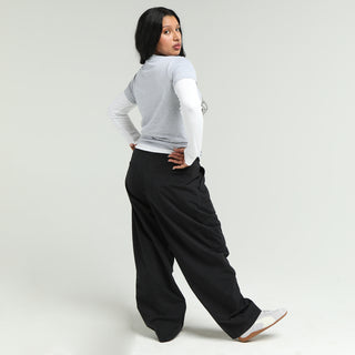 Women's black barrel pants with wide barrel silhouette and relaxed drape