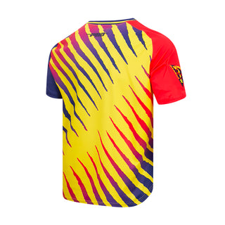 Angled back of multicolor Club America tee with a sleeve crest