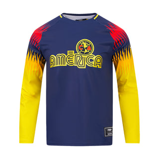Club America long-sleeve tee with navy body, yellow sleeves, red shoulder accents and front crest