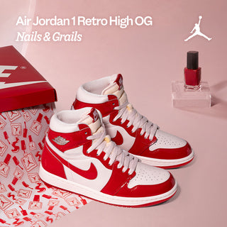 Red and white Air Jordan 1 Retro High OG sneakers with Nike shoeboxes, red nail polish, and the text “Nails & Grails.