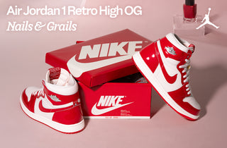 Promotional image of red and white Air Jordan 1 Retro High OG sneakers with Nike shoeboxes, red nail polish, and the text “Nails & Grails.