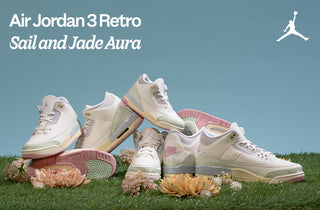 Air Jordan 3 Retro sneakers in Sail and Jade Aura on grass with a blue sky background