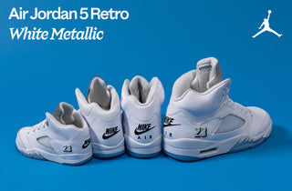 White metallic Air Jordan 5 Retro sneakers on a blue background with Jordan logo.