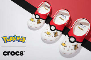 Crocs x Pokémon Classic Clog in white and red Poké Ball design with Pikachu and Eevee Jibbitz charms.