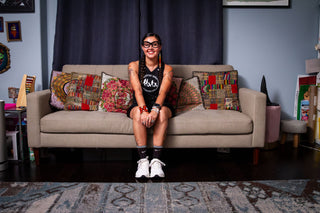 Cover image of Mixpe siting on sofa