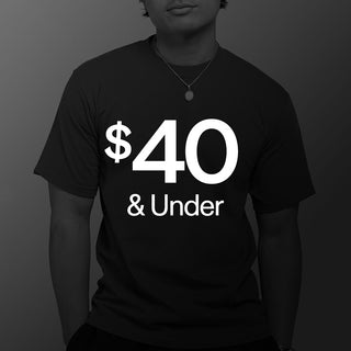 Person wearing a black T-shirt with a pendant necklace, with “ shop $40 & Under” text