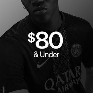 Person wearing a black Nike Paris Saint-Germain soccer jersey, with “shop $80 & Under” text.